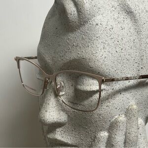 Carolina Herrera Glasses in Rose Gold - Stainless Steel